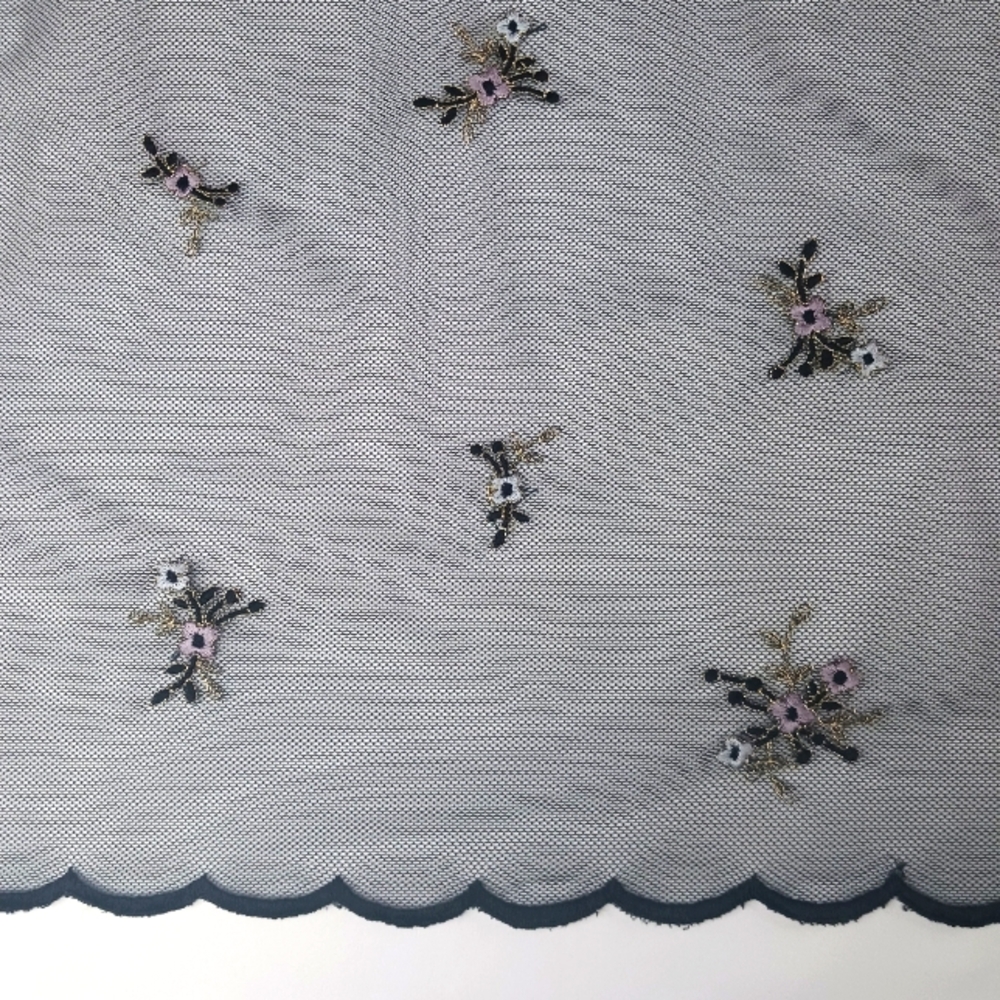 Scalloped Edge Black Mesh with Light Purple Floral Embroidery Fabric.